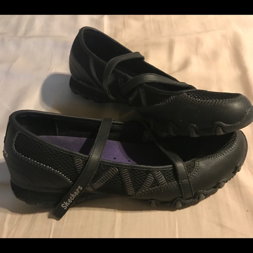 Sketchers black slip on shoes size 7.5.